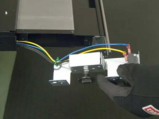 PHOTO: Slide the switch bracket out.