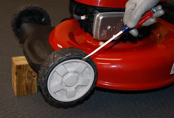 PHOTO: Pry off the hub cap.