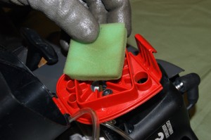PHOTO: Remove the air filter from the line trimmer.