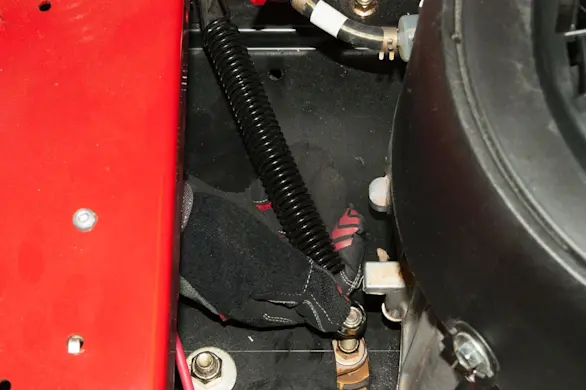 PHOTO: Push the idler bracket inward.