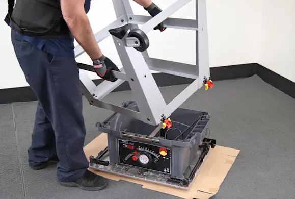 PHOTO: Remount the stand on the saw base.
