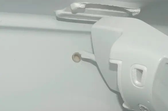PHOTO: Line up the drain tube.