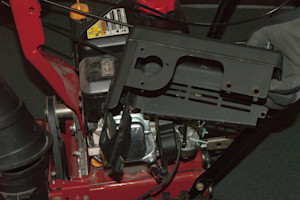 Remove the muffler shroud.