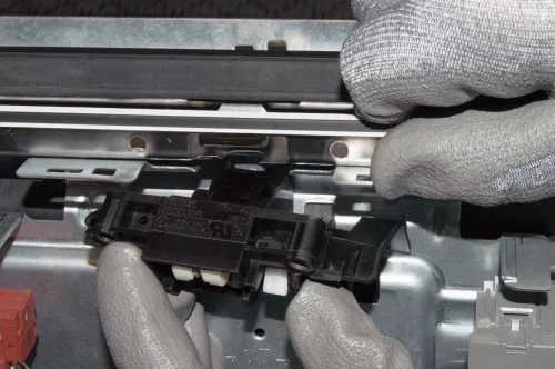 PHOTO: Remove the door latch assembly.