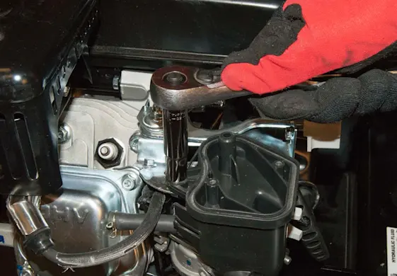 PHOTO: Remove the top bolt.