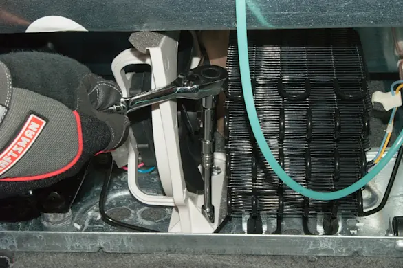 PHOTO: Remove the base screws.