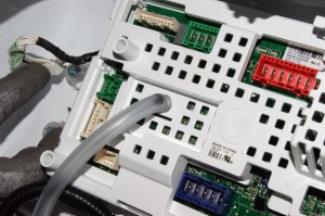 PHOTO: Disconnect the air hose from the back of the control board.