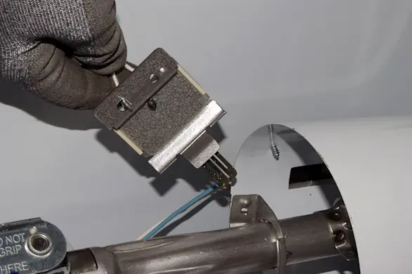 PHOTO: Remove the dryer igniter.