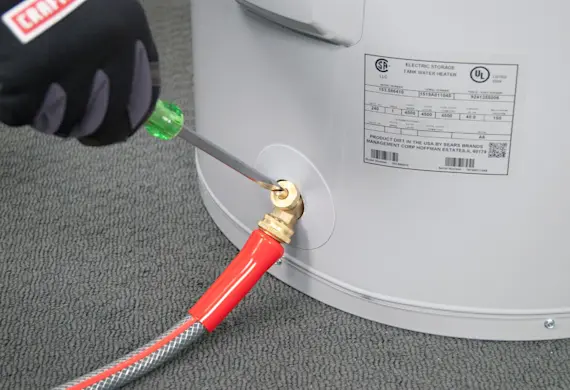 PHOTO: Open the drain valve.