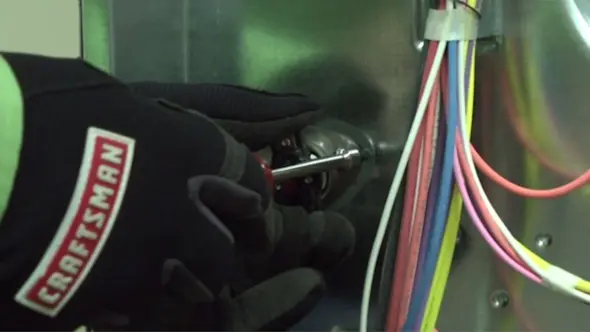 PHOTO: Install the new thermal switch.