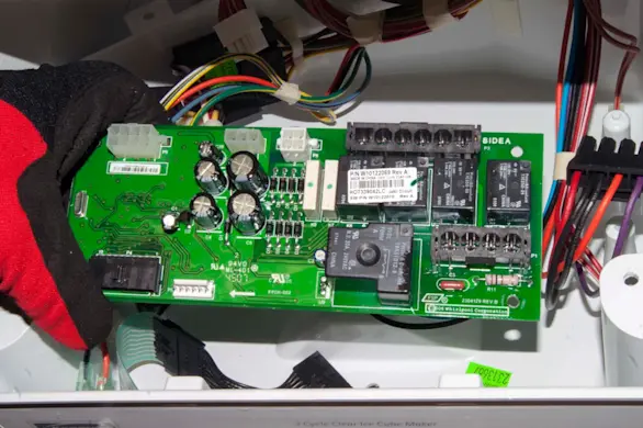PHOTO: Remove the control board.