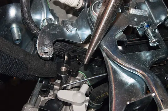 PHOTO: Reconnect the governor spring.