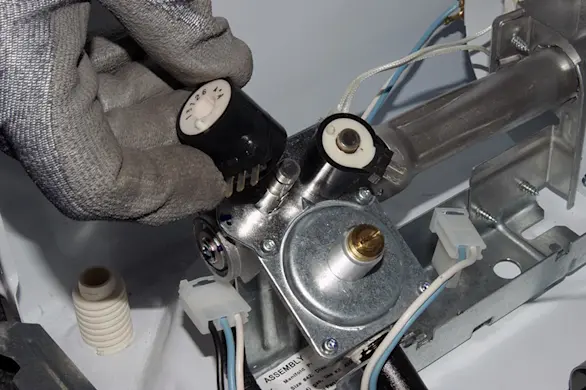 PHOTO: Remove the valve coils.