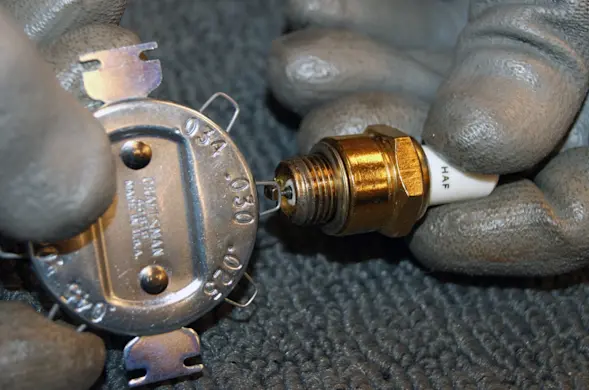 PHOTO: Gap the spark plug.