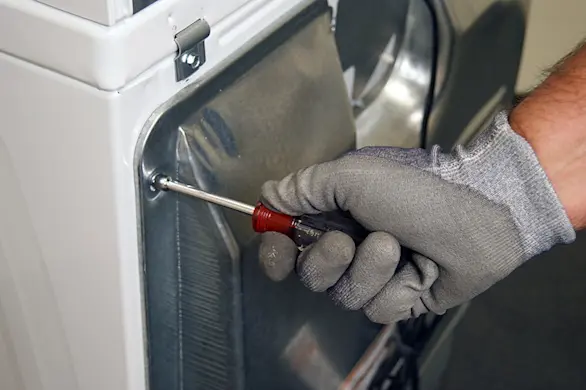 PHOTO: Remove the back panel screws.