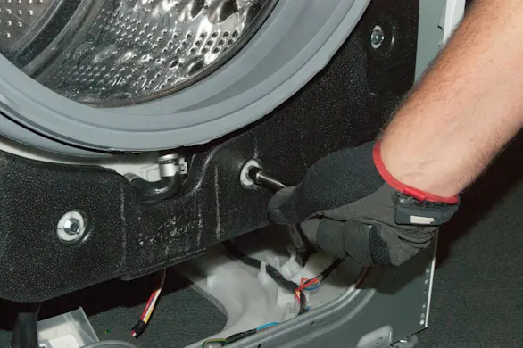 PHOTO: Reinstall the counterbalance weights.