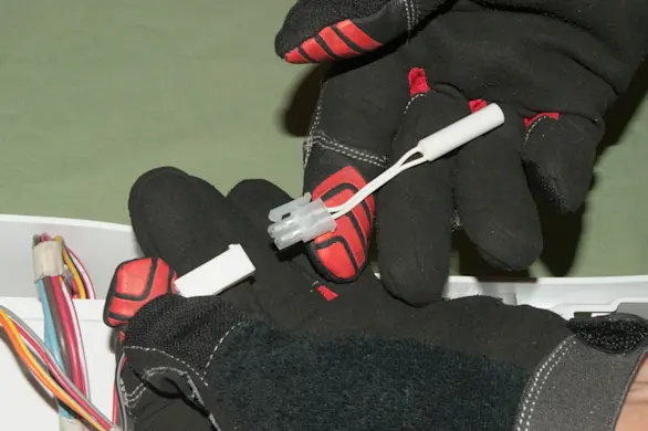 PHOTO: Plug in the thermistor wire harness.