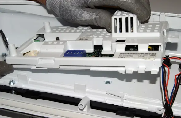 PHOTO: Remove the electronic control board.