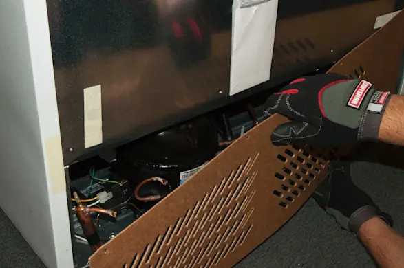 PHOTO: Remove the rear cover.