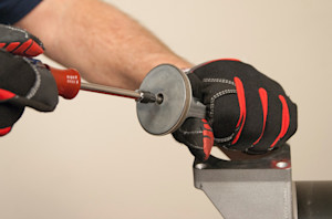 Remove the Torx screw.