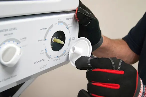 PHOTO: Reinstall the timer knob skirt.