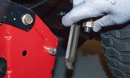 PHOTO: Reconnect the mower deck.