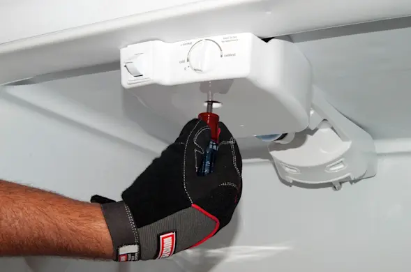 PHOTO: Reinstall the screw.
