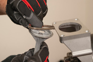 Install the new compression ring.