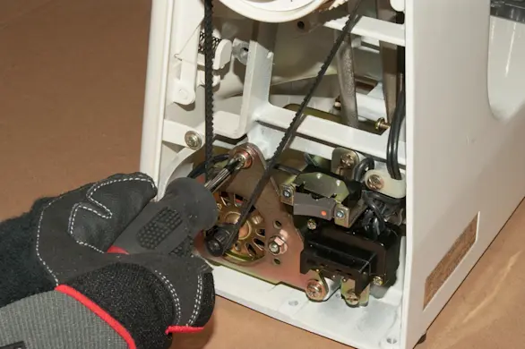PHOTO: Tighten the motor mounting screws.