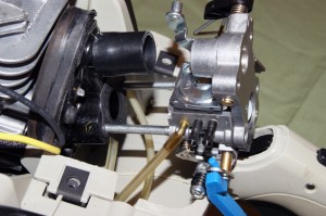 PHOTO: Carefully pull the carburetor forward on the mounting studs