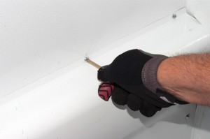 PHOTO: Remove the evaporator cover screws.