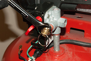 Screw the safety valve on.