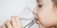 Girl drinking glass of water