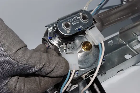 PHOTO: Remove the wires from the valve coils.