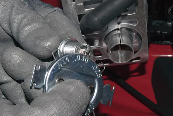 PHOTO: Gap the new spark plug.