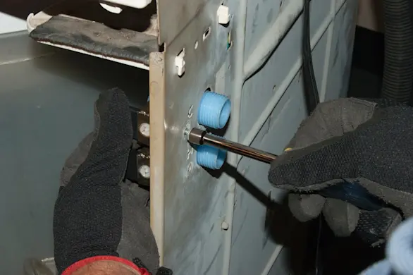 PHOTO: Attach the valve to the back panel.
