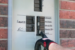PHOTO: Switch the water heater circuit breakers off.