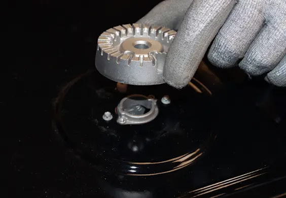 PHOTO: Pull off the burner head.