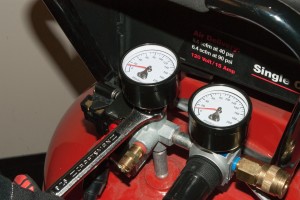 PHOTO: Remove the tank pressure gauge.