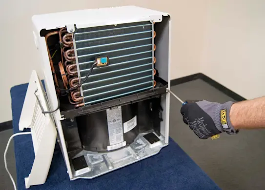 PHOTO: Remove the front screws.