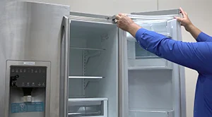 PHOTO: Install the new door gasket.