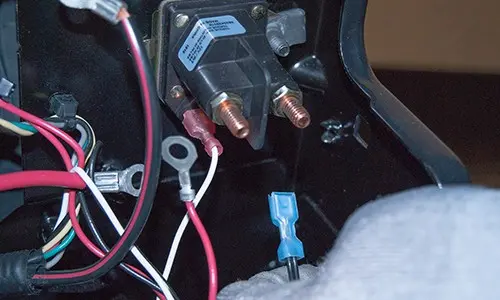 PHOTO: Connect the wires to the starter solenoid terminal posts.