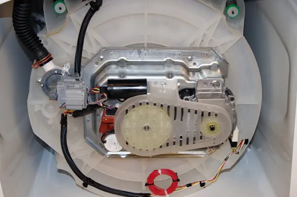 PHOTO: Lay the washer down on its front panel.