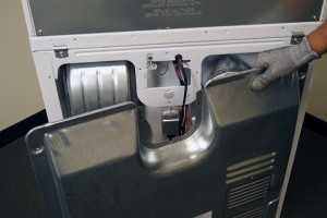 PHOTO: Remove the back panel from the dryer.