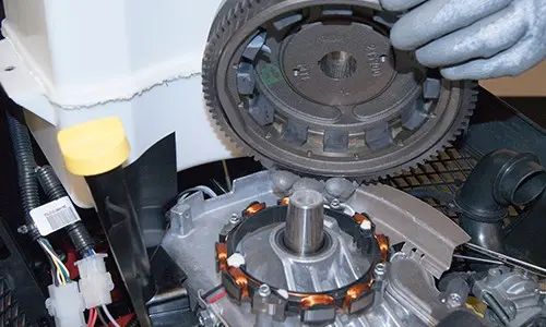 PHOTO: Remove the flywheel.
