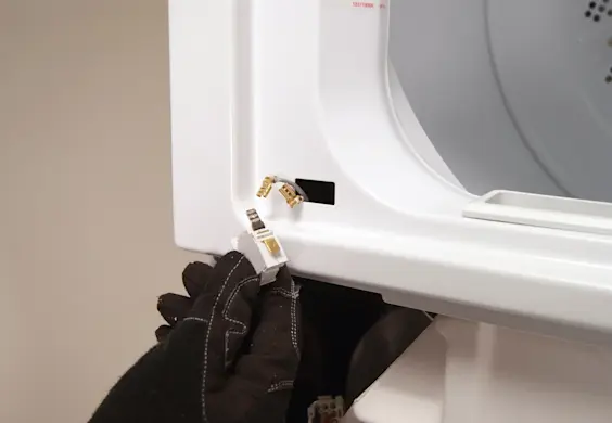 PHOTO: Remove the dryer door switch.