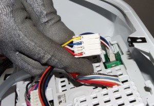PHOTO: Disconnect the lid switch/lock wire harness from the electronic control board.
