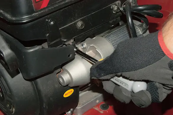 PHOTO: Reinstall the starter motor.