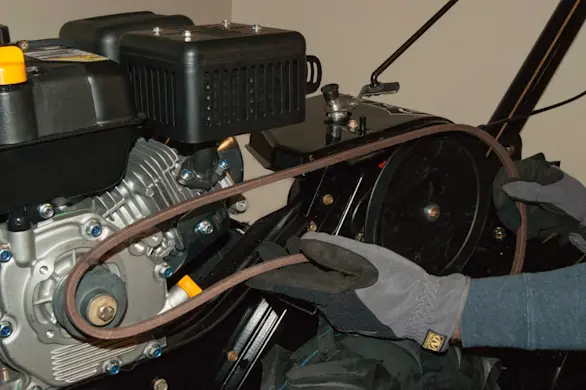 PHOTO: Remove the drive belt from the tiller.