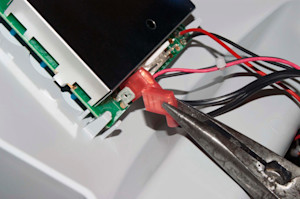 Disconnect the black wires.